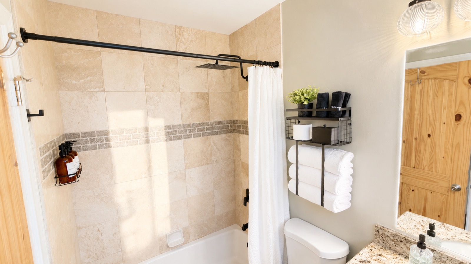 Bathroom with tiled shower and tub