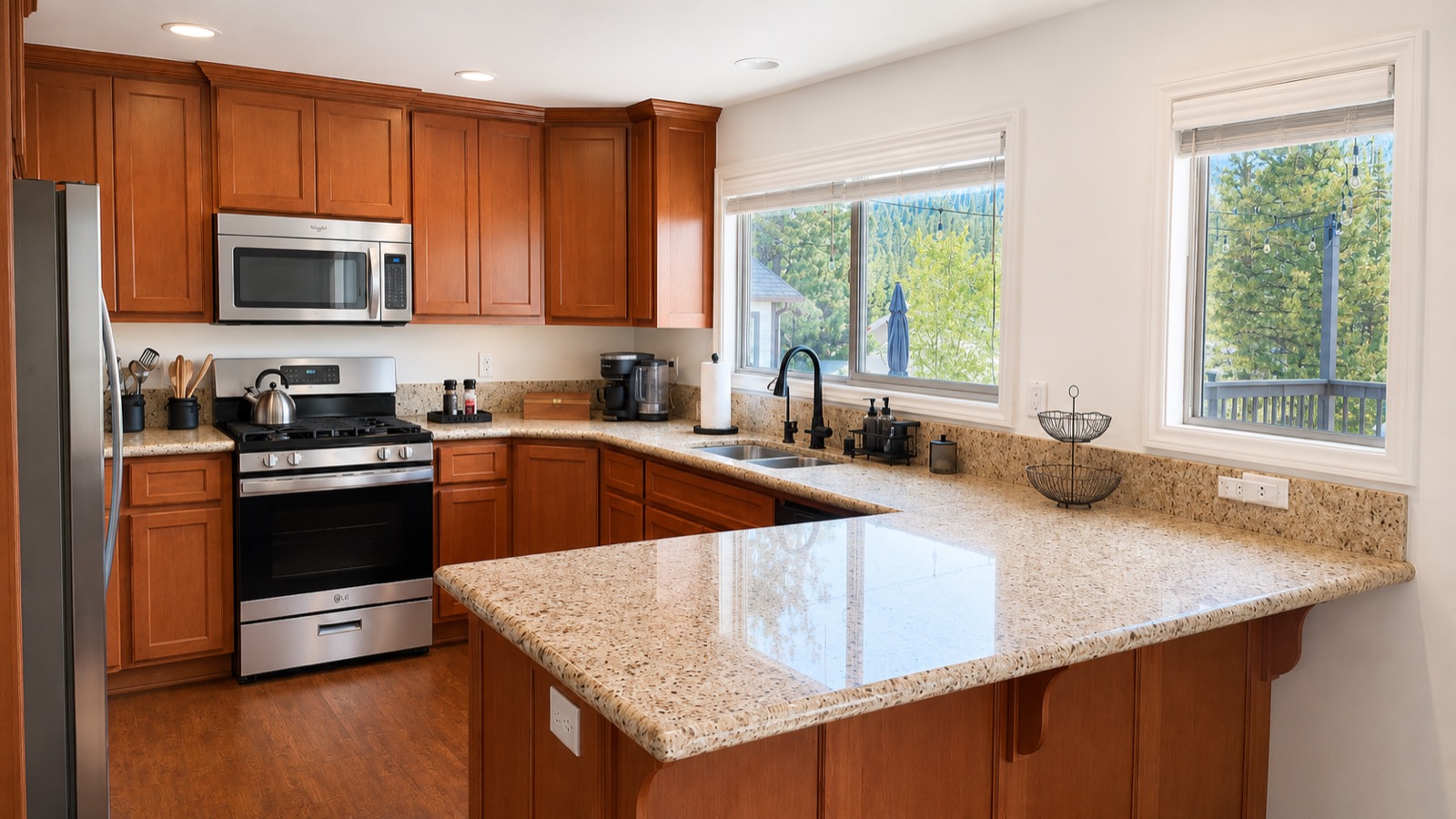 Kitchen with granite counters and stainless appliances